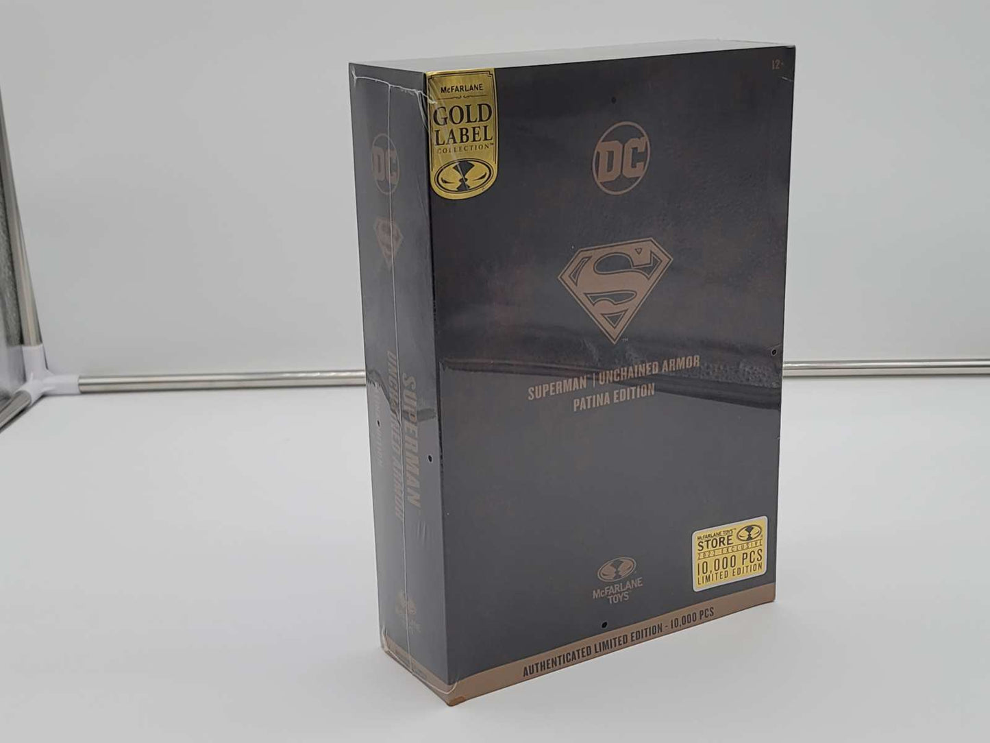 Superman (Unchained Armor) Patina Edition Gold Label 7" Figure
